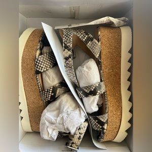 Steve Madden open toed snake skin.